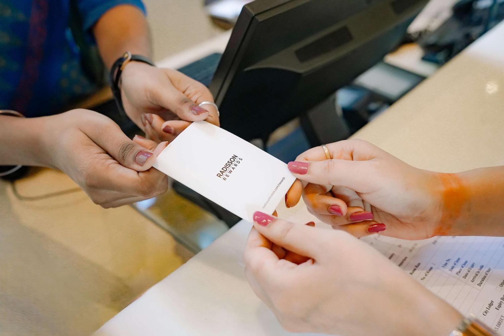 Radisson Blu Hotel Amritsar Exteriér fotografie A person's identity is verified with a passport at a border crossing.